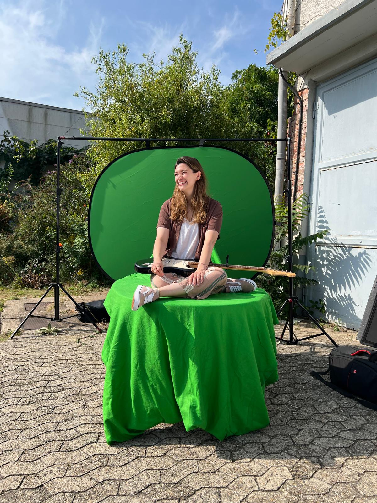 Mimose in the green screen setup during the shoot